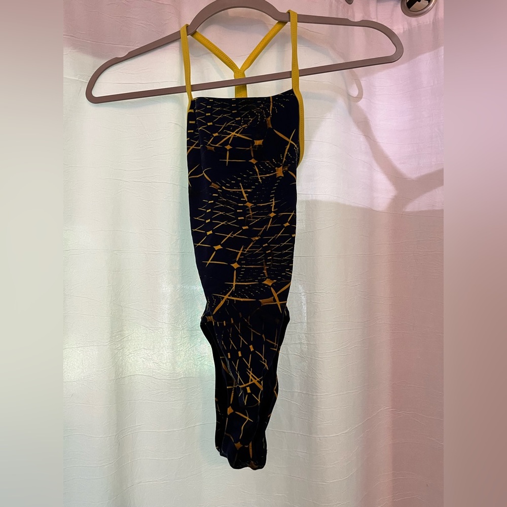 Navy blue and gold speedo endurance open back